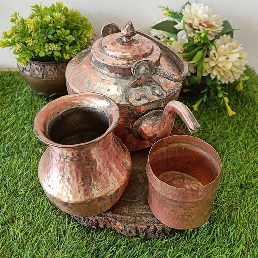 Elegant Antique Copper Kettle Set, showcasing vintage craftsmanship and intricate designs.