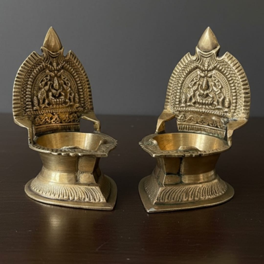 1982 Antique Brass Back Panel Diya in Pair | Sculpted Arch Oil Lamps with Pedestal Base - Bombay Antiques