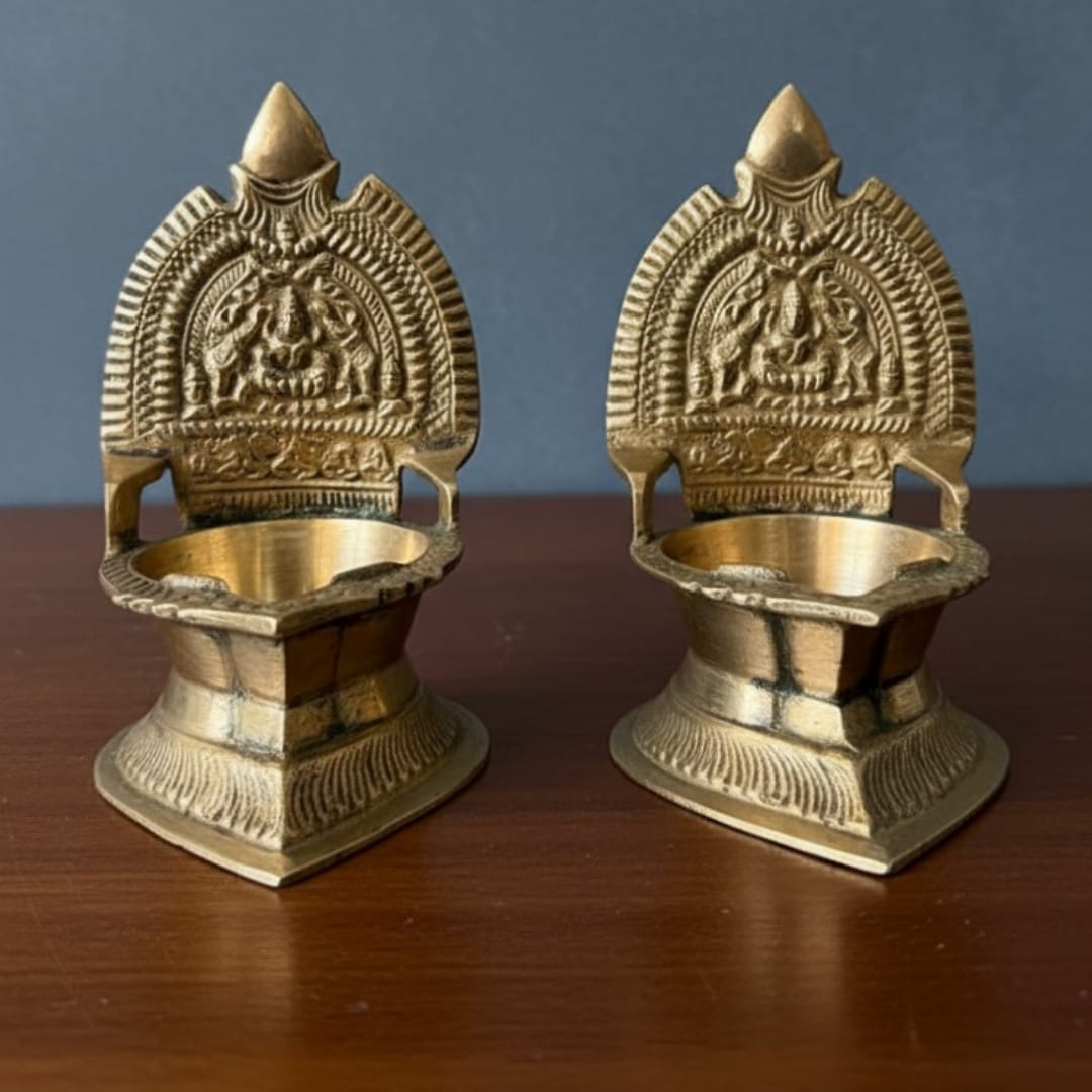 1982 Antique Brass Back Panel Diya in Pair | Sculpted Arch Oil Lamps with Pedestal Base - Bombay Antiques