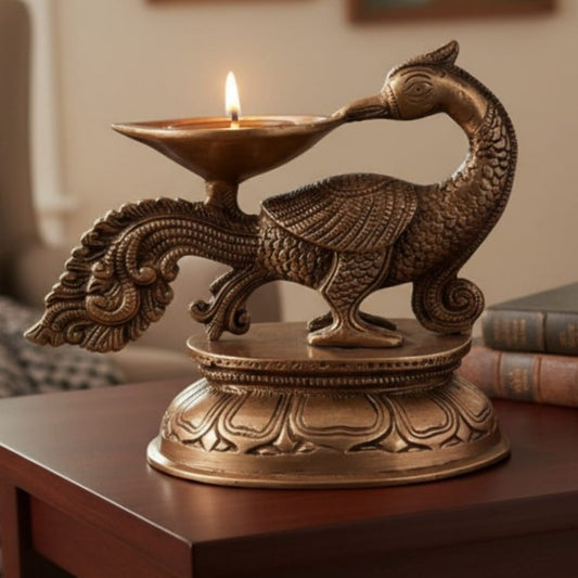 1977 Antique Brass Engraved Peacock Diya | Sculpted Oil Lamp with Detailed Base - Bombay Antiques